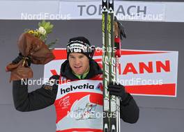 04.01.2012, Cortina-Toblach, Italy (ITA): current Tour Leader Dario Cologna (SUI), Fischer, Rottefella, Alpina, Swix, Odlo  - FIS world cup cross-country, tour de ski, individual sprint, Cortina-Toblach (ITA). www.nordicfocus.com. © Hemmersbach/NordicFocus. Every downloaded picture is fee-liable.