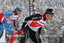 04.01.2012, Cortina-Toblach, Italy (ITA): l-r: Alexander Legkov (RUS), Rossignol, Rottefella, Swix, adidas and Dario Cologna (SUI), Fischer, Rottefella, Alpina, Swix, Odlo  - FIS world cup cross-country, tour de ski, individual sprint, Cortina-Toblach (ITA). www.nordicfocus.com. © Hemmersbach/NordicFocus. Every downloaded picture is fee-liable.