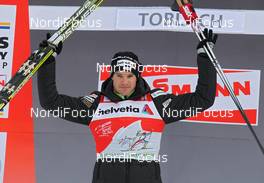 04.01.2012, Cortina-Toblach, Italy (ITA): current Tour Leader Dario Cologna (SUI), Fischer, Rottefella, Alpina, Swix, Odlo  - FIS world cup cross-country, tour de ski, individual sprint, Cortina-Toblach (ITA). www.nordicfocus.com. © Hemmersbach/NordicFocus. Every downloaded picture is fee-liable.
