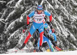 04.01.2012, Cortina-Toblach, Italy (ITA): in front Alexander Legkov (RUS), Rossignol, Rottefella, Swix, adidas  - FIS world cup cross-country, tour de ski, individual sprint, Cortina-Toblach (ITA). www.nordicfocus.com. © Hemmersbach/NordicFocus. Every downloaded picture is fee-liable.