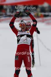 05.01.2012, Cortina-Toblach, Italy (ITA): todays winner Marit Bjoergen (NOR), Fischer, Rottefella, Swix  - FIS world cup cross-country, tour de ski, pursuit women, Cortina-Toblach (ITA). www.nordicfocus.com. © Hemmersbach/NordicFocus. Every downloaded picture is fee-liable.