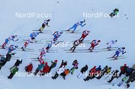 07.01.2012, Val di Fiemme, Italy (ITA): helicopter view, the leading group, in front l-r: Marcus Hellner (SWE), Fischer, Salomon, Exel, Craft and Lukas Bauer (CZE), Fischer, Rottefella, Alpina, Swix, Toko  - FIS world cup cross-country, tour de ski, mass men, Val di Fiemme (ITA). www.nordicfocus.com. © Hemmersbach/NordicFocus. Every downloaded picture is fee-liable.