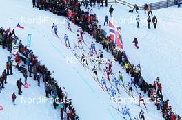 07.01.2012, Val di Fiemme, Italy (ITA): helicopter view, in front l-r: Lukas Bauer (CZE), Fischer, Rottefella, Alpina, Swix, Toko, Maxim Vylegzhanin (RUS), Fischer, Rottefella, Alpina, Swix, adidas, behind Alexander Legkov (RUS), Rossignol, Rottefella, Swix, adidas and Petter Northug (NOR), Fischer, Rottefella, Alpina, Ski Go, Swix   - FIS world cup cross-country, tour de ski, mass men, Val di Fiemme (ITA). www.nordicfocus.com. © Hemmersbach/NordicFocus. Every downloaded picture is fee-liable.