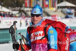 07.01.2012, Val di Fiemme, Italy (ITA): Reto Burgermeister (SUI), Team Russia - FIS world cup cross-country, tour de ski, mass men, Val di Fiemme (ITA). www.nordicfocus.com. © Hemmersbach/NordicFocus. Every downloaded picture is fee-liable.