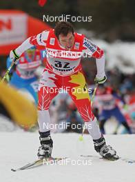 07.01.2012, Val di Fiemme, Italy (ITA): Ivan Babikov (CAN), Salomon, One Way  - FIS world cup cross-country, tour de ski, mass men, Val di Fiemme (ITA). www.nordicfocus.com. © Hemmersbach/NordicFocus. Every downloaded picture is fee-liable.