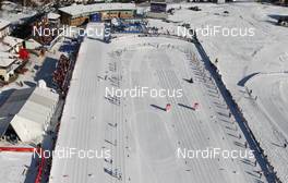 07.01.2012, Val di Fiemme, Italy (ITA): helicopter view: the field passes the stadium - FIS world cup cross-country, tour de ski, mass men, Val di Fiemme (ITA). www.nordicfocus.com. © Hemmersbach/NordicFocus. Every downloaded picture is fee-liable.