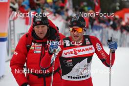 07.01.2012, Val di Fiemme, Italy (ITA): l-r: Otto Ulseth (NOR), Media Coordinator Team Norway, Petter Northug (NOR), Fischer, Rottefella, Alpina, Ski Go, Swix   - FIS world cup cross-country, tour de ski, mass men, Val di Fiemme (ITA). www.nordicfocus.com. © Hemmersbach/NordicFocus. Every downloaded picture is fee-liable.