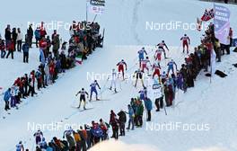 07.01.2012, Val di Fiemme, Italy (ITA): the last uphill, in front Eldar Roenning (NOR), Rossignol, Rottefella, Swix, behind Dario Cologna (SUI), Fischer, Rottefella, Alpina, Swix, Odlo  - FIS world cup cross-country, tour de ski, mass men, Val di Fiemme (ITA). www.nordicfocus.com. © Hemmersbach/NordicFocus. Every downloaded picture is fee-liable.