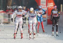 15.01.2012, Milano, Italy (ITA): exchange, l-r: Hanna Brodin (SWE), Madshus, Craft, Rottefella, Casco and Ida Ingemarsdotter (SWE), Rossignol, Rottefella, Craft  - FIS world cup cross-country, team sprint, Milano (ITA). www.nordicfocus.com. © Hemmersbach/NordicFocus. Every downloaded picture is fee-liable.