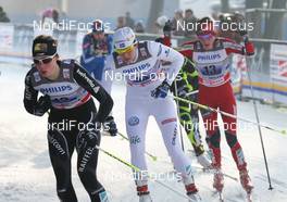 15.01.2012, Milano, Italy (ITA): group, in front Laurien van der Graaf (SUI), Odlo, One Way, Rossignol, Rottefella, behind Ida Ingemarsdotter (SWE), Rossignol, Rottefella, Craft  - FIS world cup cross-country, team sprint, Milano (ITA). www.nordicfocus.com. © Hemmersbach/NordicFocus. Every downloaded picture is fee-liable.