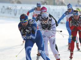 15.01.2012, Milano, Italy (ITA): l-r: Anne Kylloenen (FIN), Fischer, Swix, Craft, Rottefella and Hanna Brodin (SWE), Madshus, Craft, Rottefella, Casco  - FIS world cup cross-country, team sprint, Milano (ITA). www.nordicfocus.com. © Hemmersbach/NordicFocus. Every downloaded picture is fee-liable.