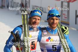 15.01.2012, Milano, Italy (ITA): 3rd, l-r: David Hofer (ITA), Fischer, Rottefella and Fulvio Scola (ITA), Fischer, One Way, Rottefella  - FIS world cup cross-country, team sprint, Milano (ITA). www.nordicfocus.com. © Hemmersbach/NordicFocus. Every downloaded picture is fee-liable.