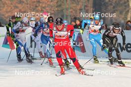 15.01.2012, Milano, Italy (ITA): group, in front Paal Golberg (NOR), Madshus, Rottefella, Alpina, Swix, behind on the right Joeri Kindschi (SUI), Atomic, Swix, Odlo  - FIS world cup cross-country, team sprint, Milano (ITA). www.nordicfocus.com. © Hemmersbach/NordicFocus. Every downloaded picture is fee-liable.