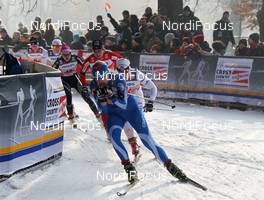15.01.2012, Milano, Italy (ITA): group, in front Anne Kylloenen (FIN), Fischer, Swix, Craft, Rottefella, behind Hanna Brodin (SWE), Madshus, Craft, Rottefella, Casco  - FIS world cup cross-country, team sprint, Milano (ITA). www.nordicfocus.com. © Hemmersbach/NordicFocus. Every downloaded picture is fee-liable.