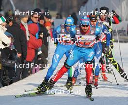 15.01.2012, Milano, Italy (ITA): group, in front Alexei Petukhov (RUS), Fischer, Fischer, Rottefella, Swix, Adidas, behind David Hofer (ITA), Fischer, Rottefella  - FIS world cup cross-country, team sprint, Milano (ITA). www.nordicfocus.com. © Hemmersbach/NordicFocus. Every downloaded picture is fee-liable.