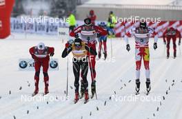 21.01.2012, Otepaeae, Estland (EST): finish, l-r: Eirik Brandsdal (NOR), Fischer, Rottefella, Alpina, Swix, Dario Cologna (SUI), Fischer, Rottefella, Alpina, Swix, Odlo, Ola Vigen Hattestad (NOR), Fischer, Rottefella, Swix, Alex Harvey (CAN), Fischer, Salomon, Swix, One Way  - FIS world cup cross-country, individual sprint, Otepaeae (EST). www.nordicfocus.com. © Hemmersbach/NordicFocus. Every downloaded picture is fee-liable.