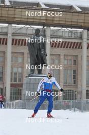 01.02.2012, Moscow, Russia (RUS): Italian athlete in front of a Lenin Statue - FIS world cup cross-country, training, Moscow (RUS). www.nordicfocus.com. © Hemmersbach/NordicFocus. Every downloaded picture is fee-liable.