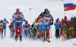 05.02.2012, Rybinsk, Russia (RUS): l-r: Sergey Turychev (RUS), Madshus, Rottefella, Swix, Adidas and Maxim Vylegzhanin (RUS), Fischer, Rottefella, Alpina, Swix, adidas  - FIS world cup cross-country, skiathlon men, Rybinsk (RUS). www.nordicfocus.com. © Hemmersbach/NordicFocus. Every downloaded picture is fee-liable.
