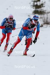 05.02.2012, Rybinsk, Russia (RUS): in the focus Maxim Vylegzhanin (RUS), Fischer, Rottefella, Alpina, Swix, adidas, behind Evgeniy Belov (RUS), Fischer, Alpina, Swix, Adidas  - FIS world cup cross-country, skiathlon men, Rybinsk (RUS). www.nordicfocus.com. © Hemmersbach/NordicFocus. Every downloaded picture is fee-liable.