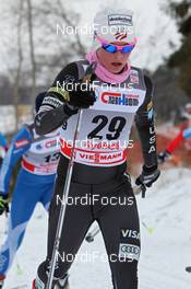 05.02.2012, Rybinsk, Russia (RUS): Jessica Diggins (USA), Salomon, Swix  - FIS world cup cross-country, skiathlon women, Rybinsk (RUS). www.nordicfocus.com. © Hemmersbach/NordicFocus. Every downloaded picture is fee-liable.