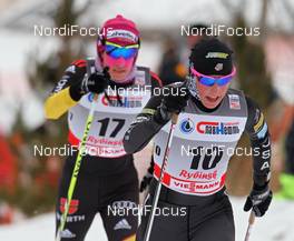 05.02.2012, Rybinsk, Russia (RUS): in front Kikkan Randall (USA), Fischer, Salomon, Swix, behind Nicole Fessel (GER), Rossignol, Rottefella, Alpina, One Way, adidas  - FIS world cup cross-country, skiathlon women, Rybinsk (RUS). www.nordicfocus.com. © Hemmersbach/NordicFocus. Every downloaded picture is fee-liable.
