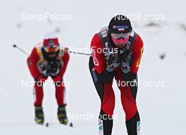 05.02.2012, Rybinsk, Russia (RUS): in front Justyna Kowalczyk (POL), Fischer, Rottefella, Swix, behind Marit Bjoergen (NOR), Fischer, Rottefella, Swix  - FIS world cup cross-country, skiathlon women, Rybinsk (RUS). www.nordicfocus.com. © Hemmersbach/NordicFocus. Every downloaded picture is fee-liable.