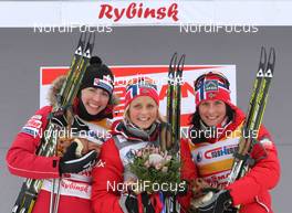 05.02.2012, Rybinsk, Russia (RUS): podium, l-r: Justyna Kowalczyk (POL), Fischer, Rottefella, Swix, Therese Johaug (NOR), Fischer, Salomon, Swix, Marit Bjoergen (NOR), Fischer, Rottefella, Swix  - FIS world cup cross-country, skiathlon women, Rybinsk (RUS). www.nordicfocus.com. © Hemmersbach/NordicFocus. Every downloaded picture is fee-liable.