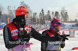03.02.2012, Rybinsk, Russia (RUS): l-r: Max Achatz (GER), ski man Team Germany and Nicole Fessel (GER), Rossignol, Rottefella, Alpina, One Way, adidas - FIS world cup cross-country, training, Rybinsk (RUS). www.nordicfocus.com. © Hemmersbach/NordicFocus. Every downloaded picture is fee-liable.