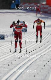 11.02.2012, Nove Mesto, Czech Republic (CZE): l-r: Marit Bjoergen (NOR), Fischer, Rottefella, Swix and Justyna Kowalczyk (POL), Fischer, Rottefella, Swix  - FIS world cup cross-country, mass women, Nove Mesto (CZE). www.nordicfocus.com. © Hemmersbach/NordicFocus. Every downloaded picture is fee-liable.