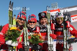 12.02.2012, Nove Mesto, Czech Republic (CZE): todays winner, l-r: Vibeke W. Skofterud (NOR), Fischer, Rottefella, Alpina, One Way, Swix, Therese Johaug (NOR), Fischer, Salomon, Swix, Astrid Uhrenholdt Jacobsen (NOR), Fischer, Rottefella, Swix, Marit Bjoergen (NOR), Fischer, Rottefella, Swix  - FIS world cup cross-country, 4x5km women, Nove Mesto (CZE). www.nordicfocus.com. © Hemmersbach/NordicFocus. Every downloaded picture is fee-liable.