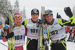 19.02.2012, Szklarska Poreba, Poland (POL): podium, l-r: 3rd Martin Bajcicak (SVK), Fischer, Salomon, Swix, Odlo, 1st Maurice Manificat (FRA), Fischer, Swix, One Way, Rottefella, 2nd Christophe Perrillat (FRA), Salomon, One Way   - FIS world uphill trophy, Szklarska Poreba (POL). www.nordicfocus.com. © Hemmersbach/NordicFocus. Every downloaded picture is fee-liable.
