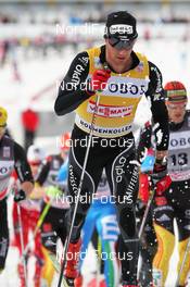 10.03.2012, Oslo, Norway (NOR): Dario Cologna (SUI), Fischer, Rottefella, Alpina, Swix, Odlo  - FIS world cup cross-country, mass men, Oslo (NOR). www.nordicfocus.com. © Hemmersbach/NordicFocus. Every downloaded picture is fee-liable.
