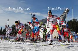 10.03.2012, Oslo, Norway (NOR): start, l-r: Marcus Hellner (SWE), Fischer, Salomon, Exel, Craft, Devon Kershaw (CAN), Fischer, Salomon, Swix, One Way, Ilia Chernousov (RUS), Rossignol, Rottefella, Swix, adidas, Alex Harvey (CAN), Fischer, Salomon, Swix, One Way  - FIS world cup cross-country, mass men, Oslo (NOR). www.nordicfocus.com. © Hemmersbach/NordicFocus. Every downloaded picture is fee-liable.