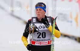 10.03.2012, Oslo, Norway (NOR): Tim Tscharnke (GER), Fischer, Swix, Alpina, Rottefella, Adidas  - FIS world cup cross-country, mass men, Oslo (NOR). www.nordicfocus.com. Â© Laiho/NordicFocus. Every downloaded picture is fee-liable.