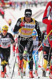 10.03.2012, Oslo, Norway (NOR): in the focus Dario Cologna (SUI), Fischer, Rottefella, Alpina, Swix, Odlo  - FIS world cup cross-country, mass men, Oslo (NOR). www.nordicfocus.com. © Hemmersbach/NordicFocus. Every downloaded picture is fee-liable.