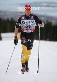 10.03.2012, Oslo, Norway (NOR): Axel Teichmann (GER), Madshus, Swix, Rottefella, Adidas  - FIS world cup cross-country, mass men, Oslo (NOR). www.nordicfocus.com. Â© Laiho/NordicFocus. Every downloaded picture is fee-liable.
