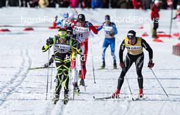 10.03.2012, Oslo, Norway (NOR): (l-r) Maurice Manificat (FRA), Fischer, Swix, Rottefella, One Way and Dario Cologna (SUI), Fischer, Swix, Alpina, Rottefella, Odlo  - FIS world cup cross-country, mass men, Oslo (NOR). www.nordicfocus.com. Â© Laiho/NordicFocus. Every downloaded picture is fee-liable.