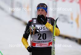 10.03.2012, Oslo, Norway (NOR):  Tim Tscharnke (GER), Fischer, Swix, Alpina, Rottefella, Adidas - FIS world cup cross-country, mass men, Oslo (NOR). www.nordicfocus.com. Â© Laiho/NordicFocus. Every downloaded picture is fee-liable.
