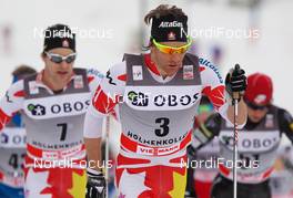 10.03.2012, Oslo, Norway (NOR): Devon Kershaw (CAN), Fischer, Swix, Salomon, One Way followed by Alex Harvey (CAN), Fischer, Swix, Salomon, One Way  - FIS world cup cross-country, mass men, Oslo (NOR). www.nordicfocus.com. Â© Laiho/NordicFocus. Every downloaded picture is fee-liable.