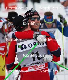 10.03.2012, Oslo, Norway (NOR): l-r: Eldar Roenning (NOR), Rossignol, Rottefella, Swix and Martin Johnsrud Sundby (NOR), Fischer, Rottefella, Swix, KV+  - FIS world cup cross-country, mass men, Oslo (NOR). www.nordicfocus.com. © Hemmersbach/NordicFocus. Every downloaded picture is fee-liable.