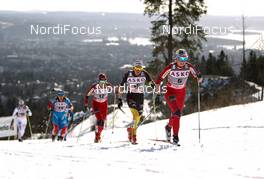 11.03.2012, Oslo, Norway (NOR): Marthe Kristoffersen (NOR), Atomic, Swix, Salomon followed by Nicole Fessel (GER), Rossignol, One Way, Alpina, Rottefella, Adidas and Heidi Weng (NOR), Madshus, Swix, Alpina, Rottefella  - FIS world cup cross-country, 30km mass women, Oslo (NOR). www.nordicfocus.com.Â© Laiho/NordicFocus. Every downloaded picture is fee-liable.