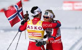 11.03.2012, Oslo, Norway (NOR): (l-r) Marit Bjoergen (NOR), Fischer, Swix, Rottefella and Therese Johaug (NOR), Fischer, Swix, Salomon  - FIS world cup cross-country, 30km mass women, Oslo (NOR). www.nordicfocus.com. Â© Laiho/NordicFocus. Every downloaded picture is fee-liable.