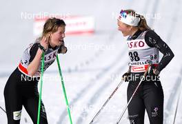 11.03.2012, Oslo, Norway (NOR):  (l-r) Astrid Oeyre Slind (NOR), Atomic, KV+, Swix and Marte Monrad-Hansen (NOR), Fischer, Swix, Alpina, Rottefella - FIS world cup cross-country, 30km mass women, Oslo (NOR). www.nordicfocus.com.Â© Laiho/NordicFocus. Every downloaded picture is fee-liable.