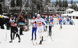 25.11.2012, Gaellivare, Sweden (SWE): l-r: Andrew Newell (USA), Lars Nelson (SWE) - FIS world cup cross-country, 4x7,5km men, Gaellivare (SWE). www.nordicfocus.com. © Felgenhauer/NordicFocus. Every downloaded picture is fee-liable.