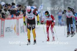 02.12.2012, Kuusamo, Finland (FIN):  Katrin Zeller (GER), Salomon, One Way, Adidas followed by Katerina Smutna (AUT), Fischer One Way, Alpina, Rottefella, Loeffler - FIS world cup cross-country, pursuit women, Kuusamo (FIN). www.nordicfocus.com. © Laiho/NordicFocus. Every downloaded picture is fee-liable.