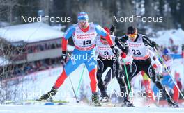 15.12.2012, Canmore, Canada (CAN):  Alexey Petukhov (RUS), Fischer, Swix, Rottefella, Adidas followed by Jovian Hediger (SUI), Rossignol, KV+, Rottefella, Odlo and Martin Jaeger (SUI), Rossignol, One Way, Rottefella, Odlo - FIS world cup cross-country, individual sprint, Canmore (CAN). www.nordicfocus.com. © Roycroft/NordicFocus. Every downloaded picture is fee-liable.