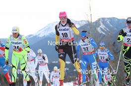 13.12.2012, Canmore, Canada (CAN): l-r Barbara Jezersek (SLO) Atomic, One Way, Denise Herrmann (GER) Fischer, Alpina, Rottefella, adidas, Swix - FIS world cup cross-country, mass women, Canmore (CAN). www.nordicfocus.com. © Roycroft/NordicFocus. Every downloaded picture is fee-liable.
