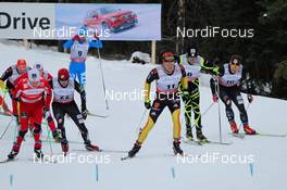 16.12.2012, Canmore, Canada (CAN): (l-r) Sjur Roethe (NOR), Fischer, KV+, Salomon, Swix , Noah Hoffman (USA), Madshus, Rottefella, Jens Filbrich (GER), Rossignol, One Way, Rottefella, Adidas, Maurice Manificat (FRA), Fischer, Swix, Rottefella, One Way and Kris Freeman (USA), Fischer, Swix, Alpina, Rottefella  - FIS world cup cross-country, skiathlon men, Canmore (CAN). www.nordicfocus.com. © Roycroft/NordicFocus. Every downloaded picture is fee-liable.