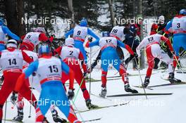 16.12.2012, Canmore, Canada (CAN):  a big group of skiers in an uphill - FIS world cup cross-country, skiathlon men, Canmore (CAN). www.nordicfocus.com. © Roycroft/NordicFocus. Every downloaded picture is fee-liable.