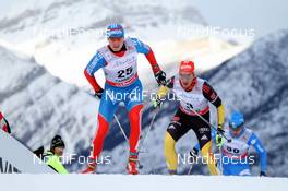 16.12.2012, Canmore, Canada (CAN): Alexander Utkin (RUS) in front of Hannes Dotzler (GER) Fischer, Alpina, Rottefella, Swix, adidas and Mattia Pellegrin (ITA) - FIS world cup cross-country, skiathlon men, Canmore (CAN). www.nordicfocus.com. © Roycroft/NordicFocus. Every downloaded picture is fee-liable.